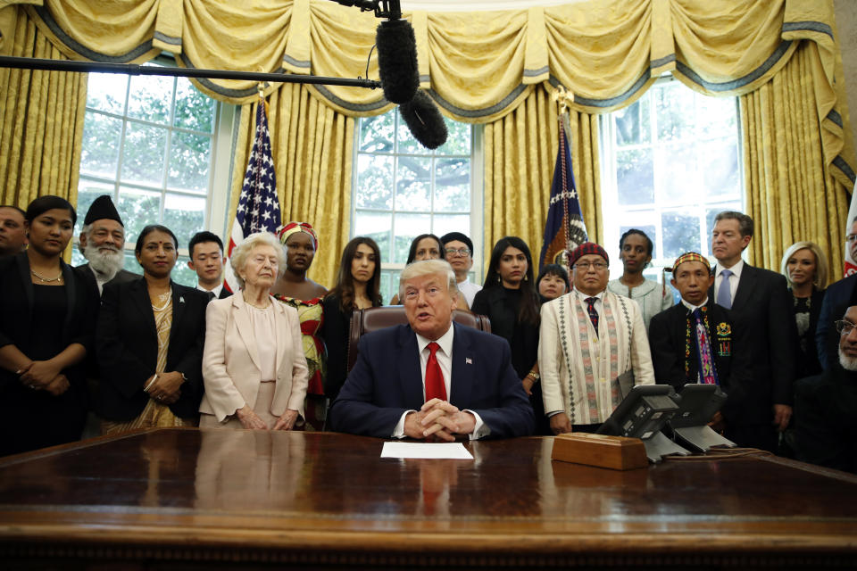 FILE - President Donald Trump speaks as he meets with survivors of religious persecution, including Hkalam Samson, standing on the first row, second from right, in the Oval Office of the White House on Wednesday, July 17, 2019, in Washington. Hkalam Samson, prominent Christian church leader and human rights advocate from Myanmar’s Kachin ethnic minority, was detained by the authorities just hours after he was released from prison under an amnesty by the military government, a relative, a colleague and local media said Thursday, April 18, 2024. (AP Photo/Alex Brandon, File)
