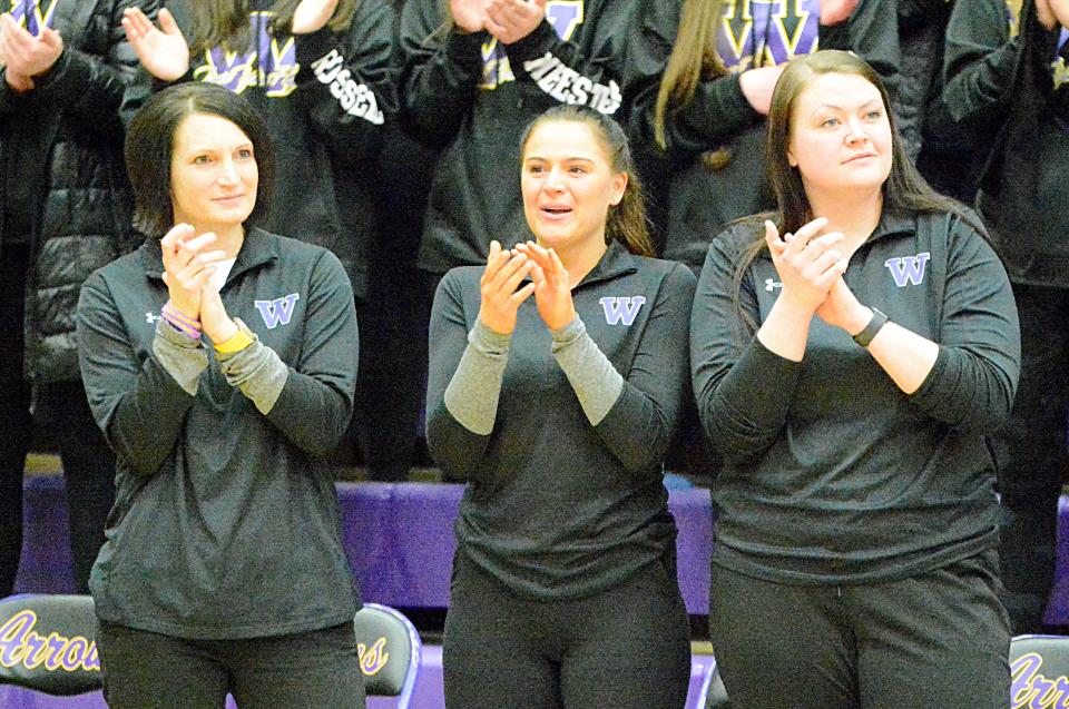 Former Watertown High School standout and current assistant coach Tia Hemiller (center) has been named the new head girls basketball coach at Rapid City Central High School. She is pictured this winter with fellow WHS assistants Stacey Hendricks (left) and and Mackenzie Buelow.