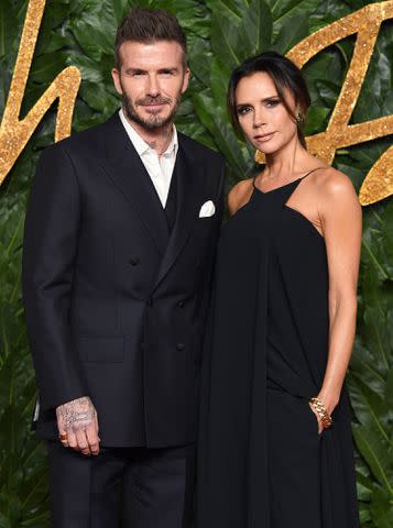 Karwai Tang/WireImage David and Victoria Beckham arrive at the 2018 Fashion Awards in London.