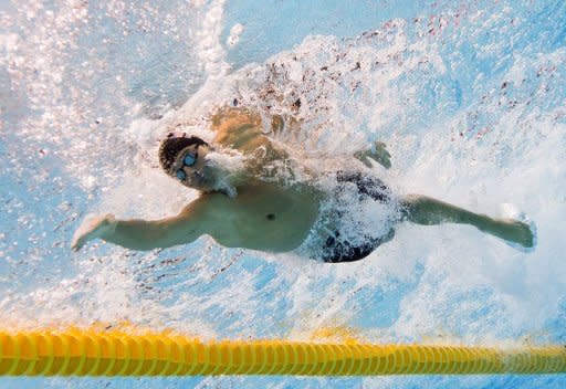 US swimmer Ryan Lochte competes in the men's 200m individual medley final swimming event at the London 2012 Olympic Games in London. Lochte's London Olympics ended with a whimper on Thursday as a brutal backstroke-medley double failed to yield gold and he succumbed yet again to old foe Michael Phelps