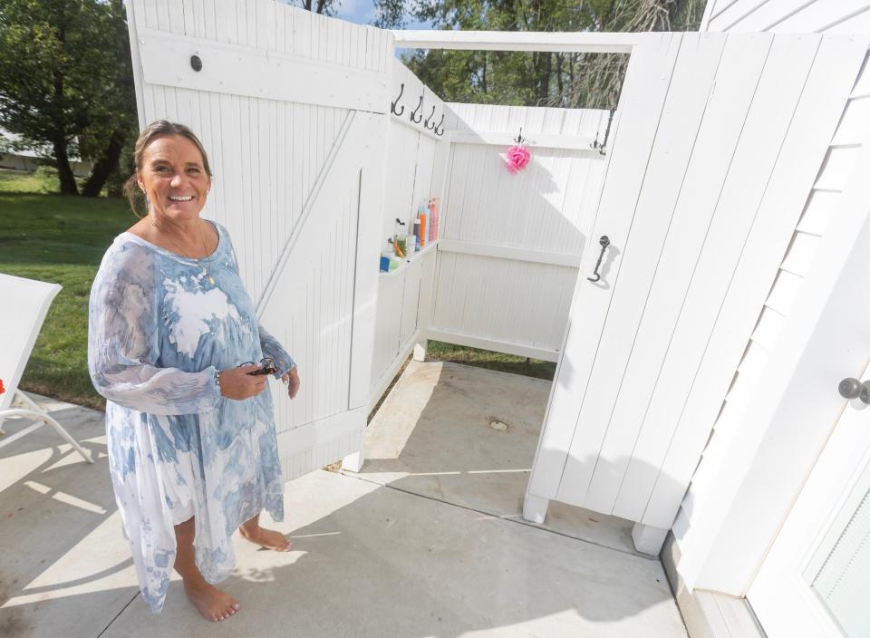 Sally Goodnow grew up with an outdoor shower. Michael Kell incorporated the feature in the modern farmhouse he built for them in Plain Township.