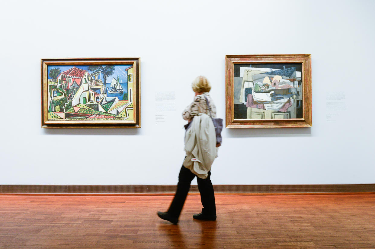 VIENNA, AUSTRIA - 2019/09/28: A woman walks by a painting of Spanish painter, Pablo Picasso during the exhibition. The Batliner Collection in Albertina Museum presents its extensive holdings of classical modernist paintings, which come from the Batliner Collection. The overview of the most interesting chapters of 130 years of art history is made possible by this permanent collection from various painters. (Photo by Omar Marques/SOPA Images/LightRocket via Getty Images)