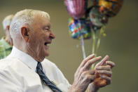 Charles Coolidge laughs and claps as friends and family finish singing for him at his 90th birthday celebration held at Outdoor Chattanooga on Aug. 6, 2011, in Chattanooga, Tenn. The Congressional Medal of Honor Society announced in a statement that Coolidge died Tuesday, April 6, 2021, in Chattanooga. He was 99. Coolidge received the Medal of Honor for actions he took in October 1944 during WWII. (Alex Washburn/Chattanooga Times Free Press via AP)