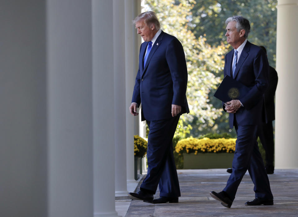 FILE - In this Nov. 2, 2017, file photo President Donald Trump walks with Federal Reserve board member Jerome Powell before announcing him as his nominee for the next chair of the Federal Reserve in the Rose Garden of the White House in Washington. Trump is keeping up his attacks on Federal Reserve Chairman Powell, saying he “made” Powell but now would like to trade him in for Mario Draghi, the head of the European Central Bank. (AP Photo/Pablo Martinez Monsivais, File)