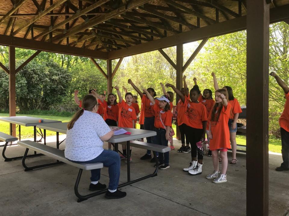 Sherman Elementary third graders in the school's leadership team program celebrated with Dayspring residents at the annual picnic Friday, singing and playing bubbles.