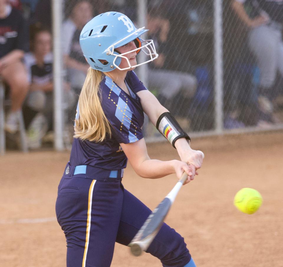 Burns' Meah Ivie makes contact during the fifth inning of her team's 13-1 win over East Gaston on April 12, 2022.