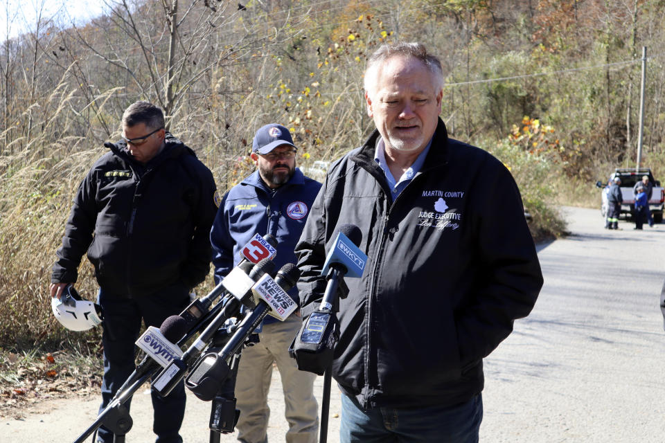 Martin County Judge Executive Lon Lafferty addresses reporters outside a road leading to the abandoned Martin Mine Prep Plant in Inez, K.Y. ,Wednesday, Nov. 1, 2023, where the collapse of an 11-story coal tipple killed at least one man. (AP Photo/Leah Willingham)