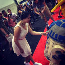 Cosplaying Leia inserting Death Star plans on R2-D2. Hope she realizes that’s just a Lego droid and all those Bothan spies didn’t die for naught.