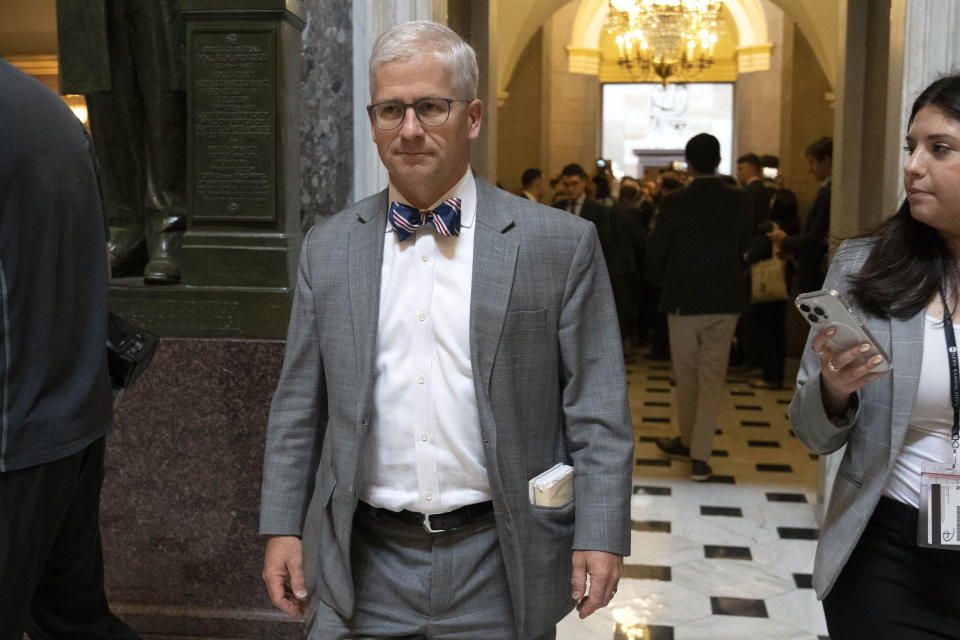 Rep. Patrick McHenry, R-N.C., a key Republican in the debt limit negotiations and chairman of the House Financial Services Committee, walks toward the House chamber, Tuesday, May 23, 2023, on Capitol Hill in Washington, as debt limit negotiations continue. (AP Photo/Jacquelyn Martin)