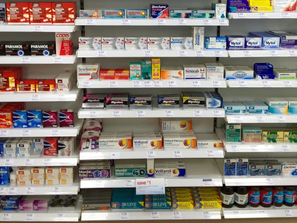 Pharmacy shelves filled with medicine at Boots