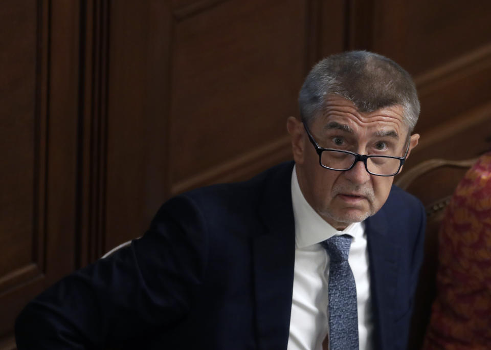 FILE - In this Wednesday, June 26, 2019, file photo, Czech Republic's Prime Minister Andrej Babis looks up during a parliament session in Prague, Czech Republic. On Wednesday, Dec. 4, 2019, the Czech Republic's prosecutor general has overturned a previous decision by the prosecution to drop charges against Czech Prime Minister Andrej Babis over alleged fraud involving European Union subsidies. (AP Photo/Petr David Josek, File)