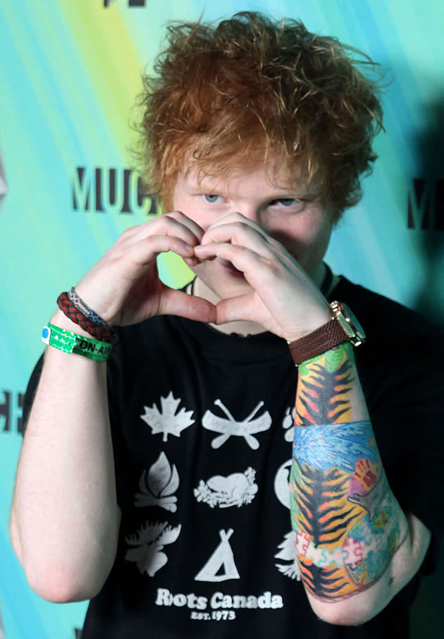 Celebrity photos: Ed Sheeran showed love for his fans this week at the MuchMusic Awards, by putting his hands in the shape of a heart. Cute.