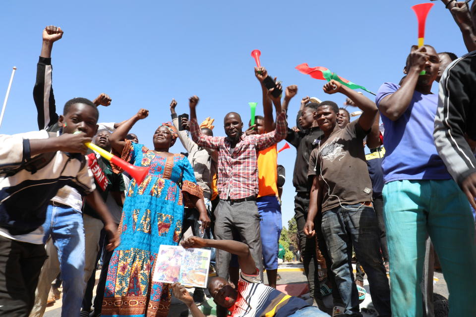 People gather in support of a coup that ousted President Roch Kabore,  dissolved government, suspended the constitution and closed borders in Burkina Faso, Ouagadougou January 25, 2022. REUTERS/ Vincent Bado