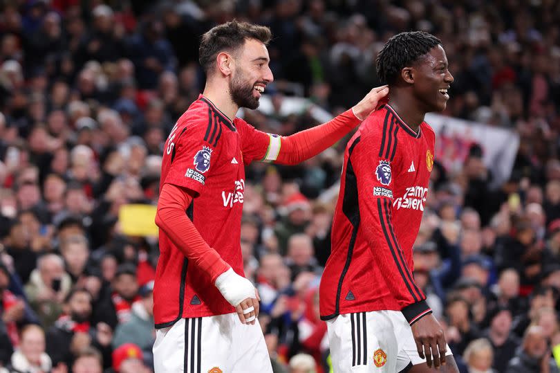 Bruno Fernandes and Kobbie Mainoo celebrate after scoring against Sheffield United