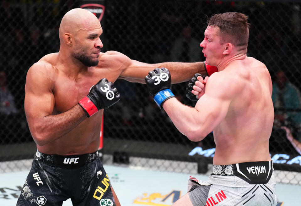 LAS VEGAS, NEVADA – NOVEMBER 18: (L-R) Christian Leroy Duncan of England punches Denis Tiuliulin of Russia in a middleweight fight during the UFC Fight Night event at UFC APEX on November 18, 2023 in Las Vegas, Nevada. (Photo by Chris Unger/Zuffa LLC via Getty Images)