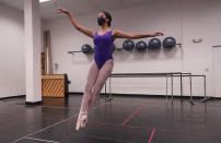 Ballet student Micah Sparrow dances in a classroom at the Texas Ballet Theatre, Wednesday, Oct. 7, 2020, in Fort Worth, Texas. For many, it's not Christmas without the dance of Clara, Uncle Drosselmeyer, the Sugar Plum Fairy, the Mouse King and, of course, the Nutcracker Prince. But this year the coronavirus pandemic has canceled performances of “The Nutcracker” around the U.S. and Canada, eliminating a major and reliable source of revenue for dance companies already reeling financially following the essential shutdown of their industry. (AP Photo/LM Otero)