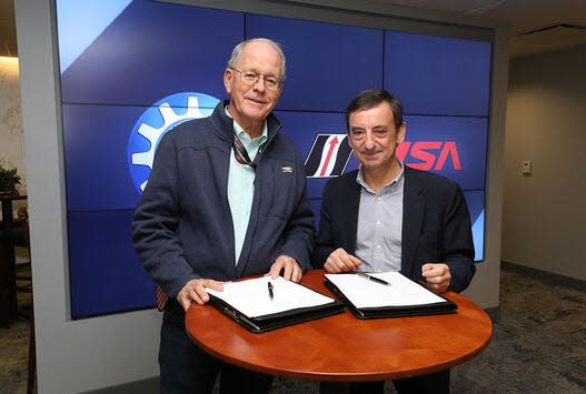Jim France (left) and his European road-racing cohort, Pierre Fillon, earlier this year announcing the agreement to blend the Daytona and Le Mans racing fields beginning in 2023.