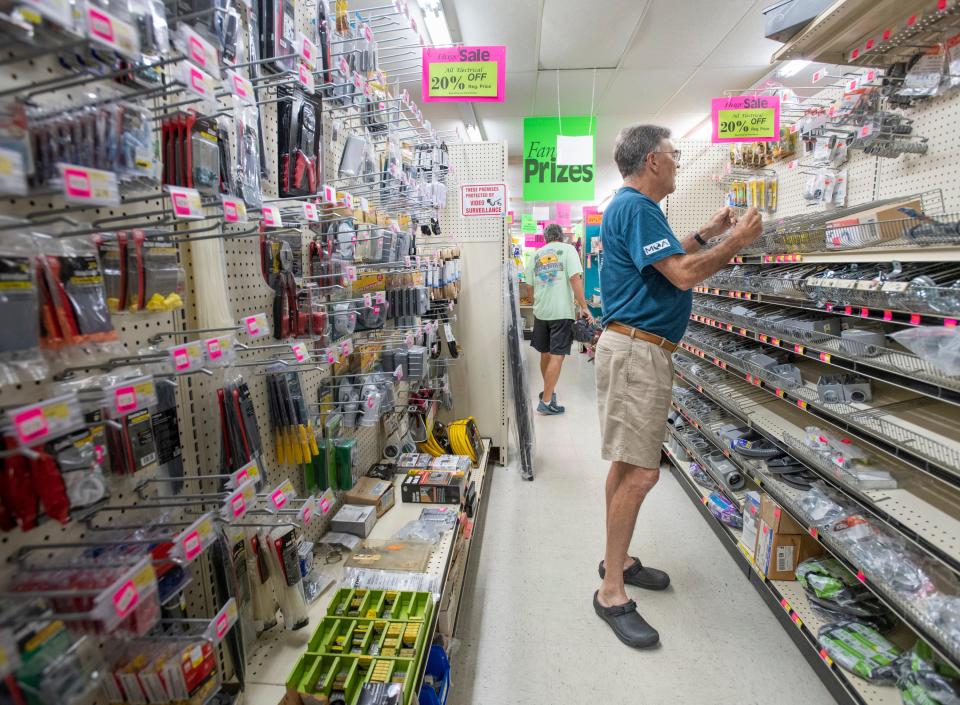 Longtime customer Gene MacNaughton shops at Warrington Hardware & Marine in Pensacola on Thursday. The Barrancas Avenue staple will close its doors this year after 80 years in business.