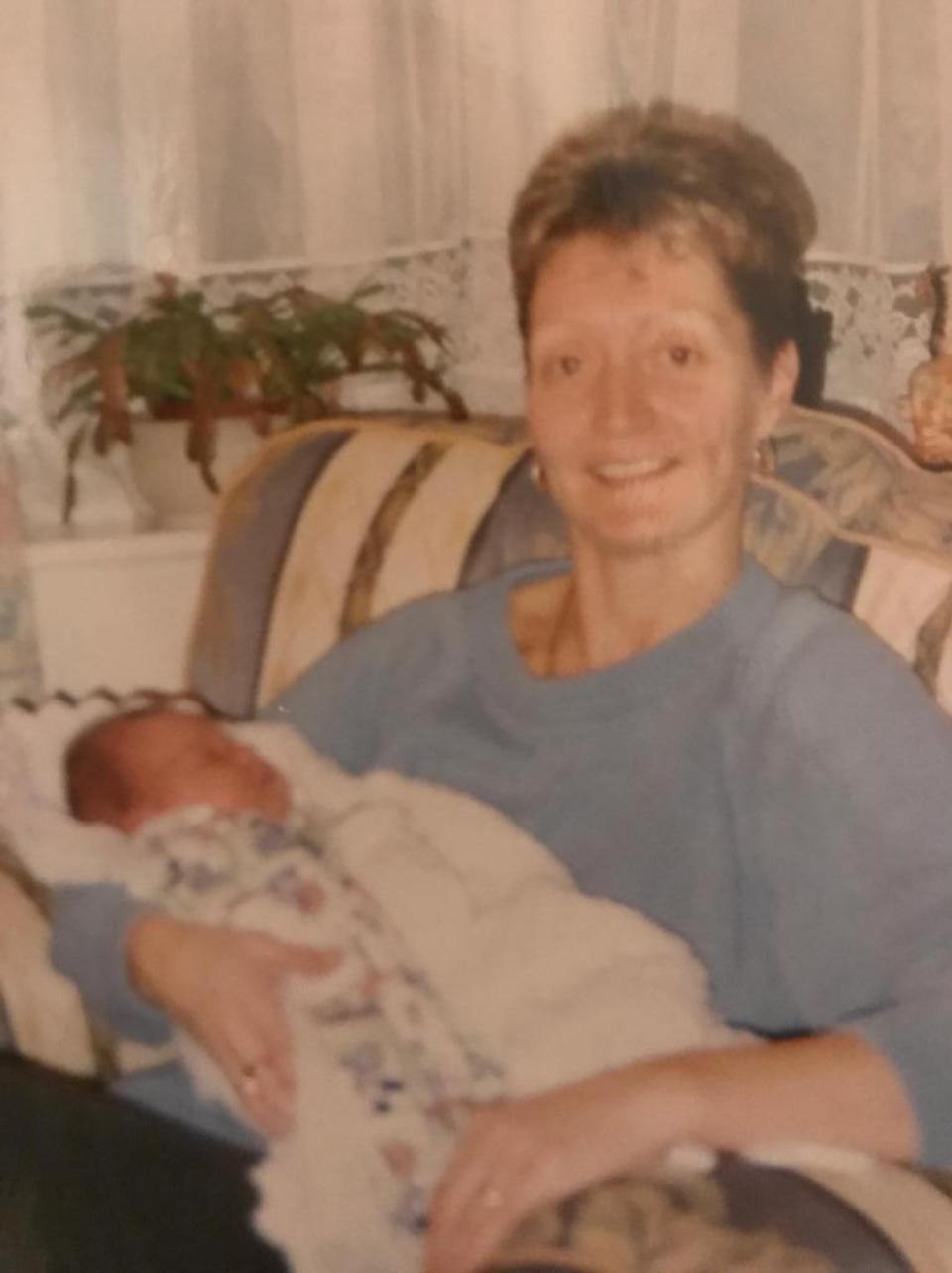 Margaret Newsome, now 83, holding Eleanor Arundel, as a baby. (Caters)