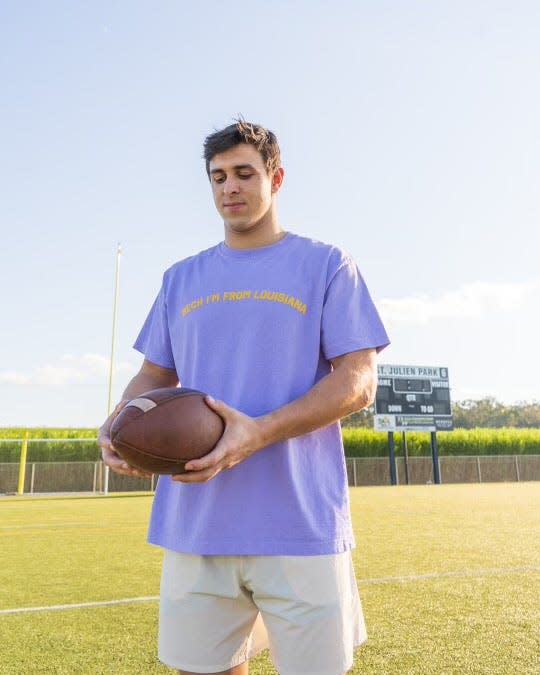 LSU wide receiver Jack Bech wearing customized gear in an NIL promotion shoot with Motier Lafayette.