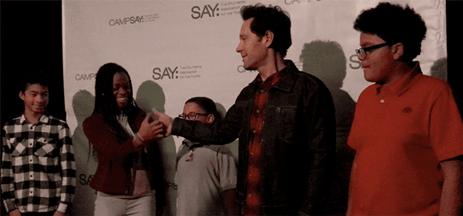 Paul Rudd with some of the SAY kids on the red carpet at his bowling event on Monday. (Image: Yahoo)