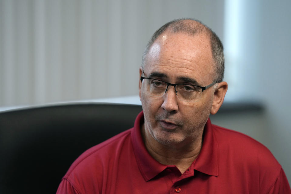 File - United Auto Workers President Shawn Fain is interviewed, Wednesday, Sept. 6, 2023, in Detroit. The union is threatening to strike any automaker that hasn't reached an agreement by the time contracts expire on Sept. 14. (AP Photo/Carlos Osorio, File)