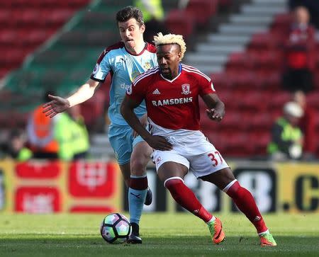 Britain Football Soccer - Middlesbrough v Burnley - Premier League - The Riverside Stadium - 8/4/17 Burnley's Joey Barton in action with Middlesbrough's Adama Traore Reuters / Scott Heppell Livepic