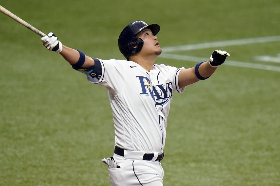 Tampa Bay Rays' Yoshi Tsutsugo, of Japan, follows the flight of his foul ball during the fourth inning of a baseball game against the New York Yankees Saturday, April 10, 2021, in St. Petersburg, Fla. (AP Photo/Chris O'Meara)