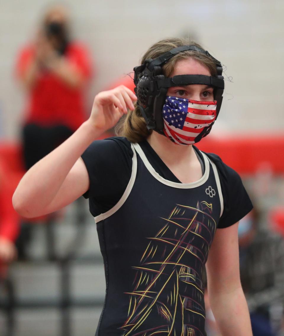 Arlington's Aislin Kellner wrestles Fox Lane's in the 102-pound match in the Section 1 Division I Dual Meet Tournament championships at Fox Lane High School in Bedford on Thursday, December 16, 2021. 