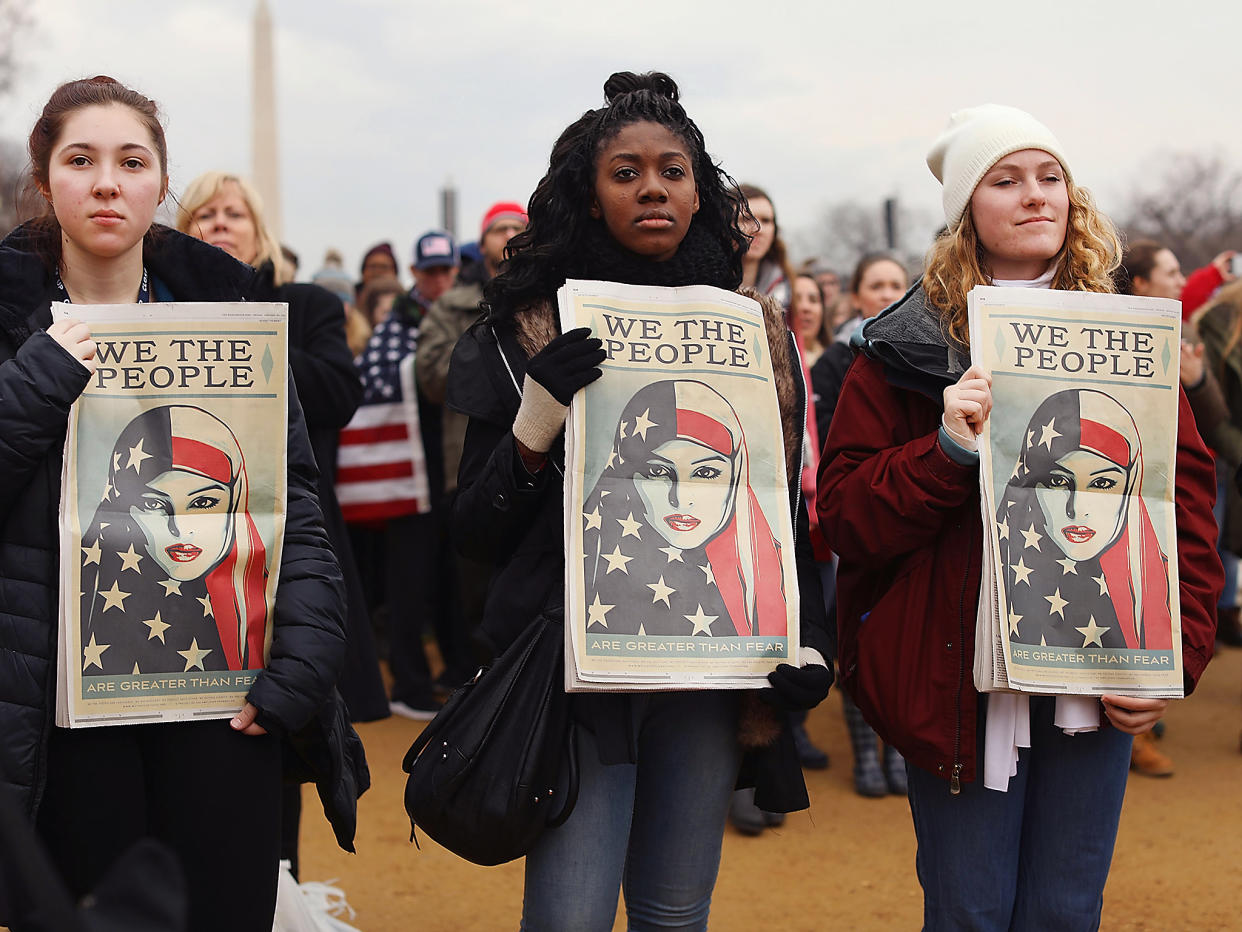 Protesters on the national mall watch the inauguration of US President Donald Trump: Getty