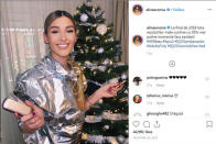 FILE PHOTO: Alina Eremia, a Romanian actress and singer whose biography gives her age as 25, holds a gold-colored IQOS device in front of a Christmas tree as part of a campaign by Philip Morris International to market the device in an Instagram post December 29, 2018. Alina Eremia/Social Media via REUTERS/File Photo