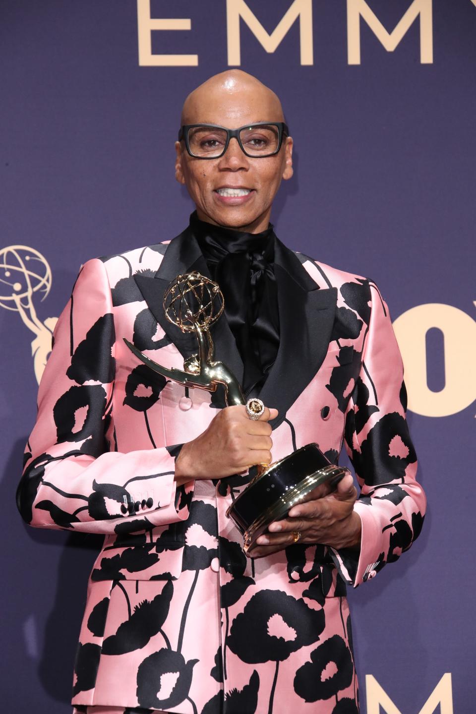 RuPaul poses for photos after "RuPaul's Drag Race" won the Emmy for outstanding competition program at the 2019 ceremony.