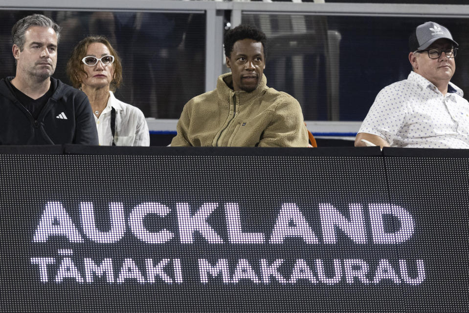 Gaël Monfils, centre, husband of Elina Svitolina of Ukraine, looks on during her quarterfinal match against Marie Bouzkova from the Czech Republic at the ASB Tennis Classic in Auckland, New Zealand, Friday, Jan. 5, 2024. (Brett Phibbs/Photosport via AP)