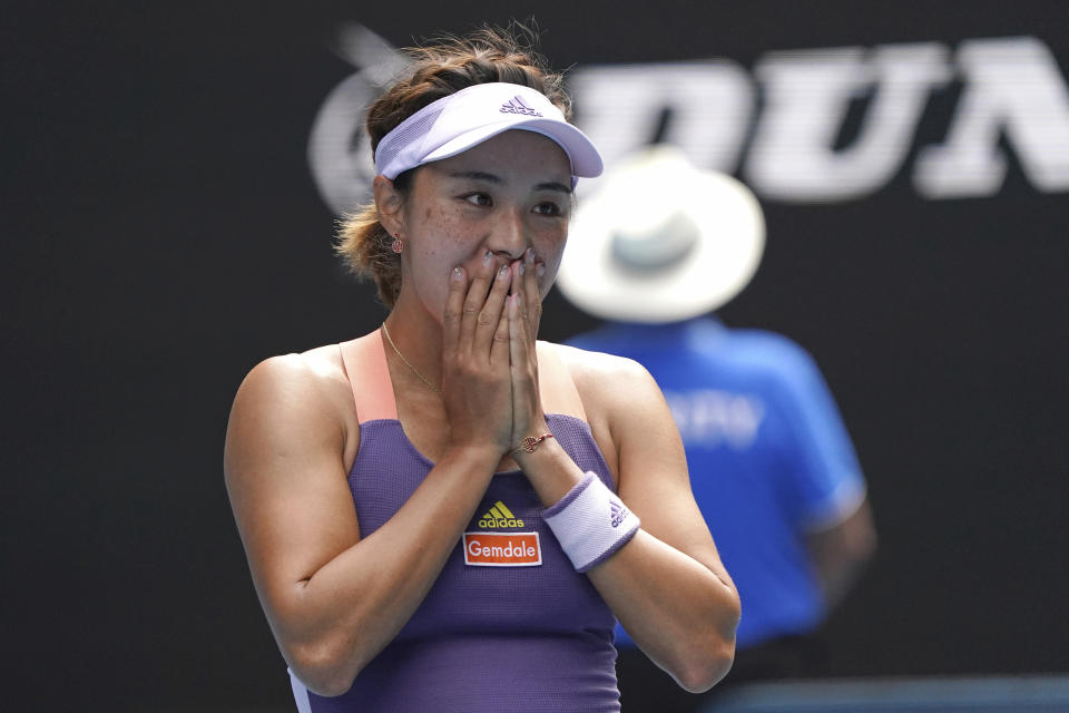 China's Wang Qiang reacts after defeating g Serena Williams of the U.S. in their third round match at the Australian Open tennis championship in Melbourne, Australia, Friday, Jan. 24, 2020. (AP Photo/Lee Jin-man)