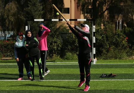 Palestinian women take part in a baseball training session in Khan Younis in the southern Gaza Strip March 19, 2017. REUTERS/Mohammed Salem