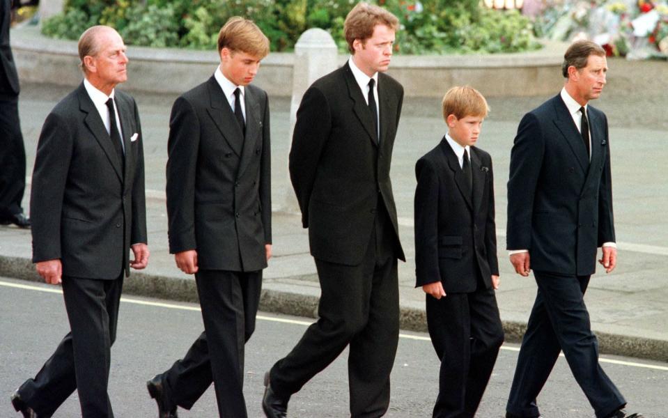 The image of Prince William, 15, and Prince Harry, 12, walking behind their mothers coffin with the Prince of Wales, Duke of Edinburgh and Earl Spencer