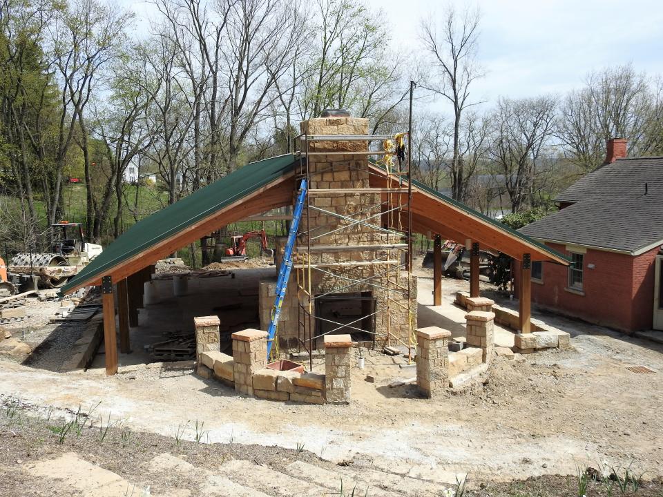 A fireplace is nearing completion at the pavilion at Clary Gardens as an aesthetic element and to provide heat during colder months. Handicapped accessible pathways are also being constructed around the pavilion and through the 20 acre facility.
