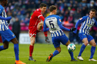 Soccer Football - Bundesliga - Bayern Munich vs Hertha BSC - Allianz Arena, Munich, Germany - February 24, 2018 Bayern Munich's Robert Lewandowski shoots at goal REUTERS/Michaela Rehle