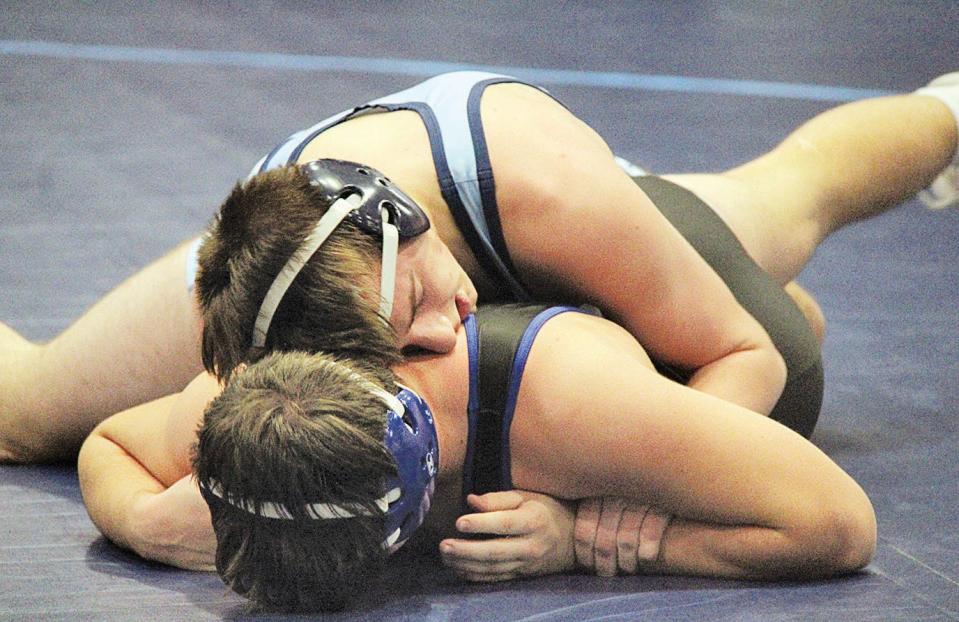 Carter Manley,k shown during his wrestling days at Bartlesville High, opened his mat career at Oklahoma Wesleyan University with powerful showing.