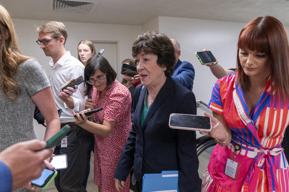 Sen. Susan Collins, R-Maine, speaks with reporters as she walks to a vote on Capitol Hill, Wednesday, Sept. 6, 2023 in Washington. (AP Photo/Alex Brandon)