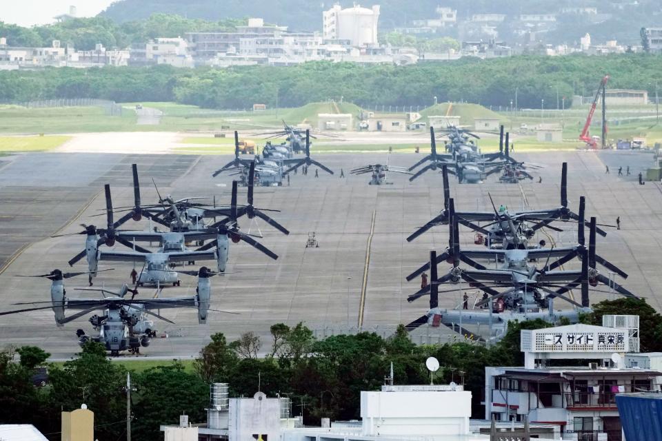 FILE - U.S. MV-22B Osprey transport aircraft are parked at the U.S. Marine Corps Air Station Futenma in Ginowan, south of Okinawa, southern Japan, Wednesday, Sept. 6, 2023. Air Force Special Operations Command said Tuesday it knows what failed on its CV-22B Osprey leading to a November crash in Japan that killed eight service members. But it still does not know why the failure happened. Because of the crash almost the entire Osprey fleet, hundreds of aircraft across the Air Force, Marine Corps and Navy, has been grounded since Dec. 6. (AP Photo/Hiro Komae, File)