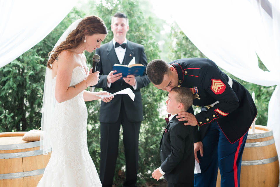 A marine’s son wept in his new stepmom’s arms at the wedding. (Credit: Jessica Husted Photography)