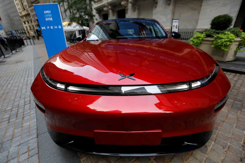 FILE PHOTO: An XPeng Inc. P7 performance electric car outside the New York Stock Exchange (NYSE) ahead of the Chinese company's IPO in New York