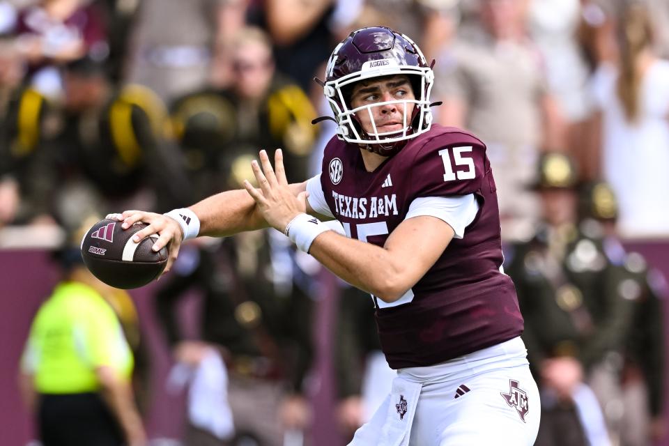 Sep 23, 2023; College Station, Texas; Texas A&M Aggies quarterback Conner Weigman (15) looks to throw the ball during the second quarter against the Auburn Tigers at Kyle Field. Maria Lysaker-USA TODAY Sports