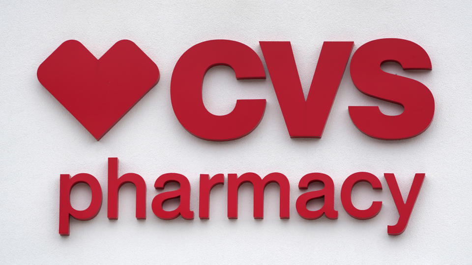 FILE - The CVS Pharmacy logo is displayed on a store on Aug. 3, 2021, in Woburn, Mass. CVS prescribed made a move Wednesday, Sept. 27, 2023, to make frustrated pharmacists in the Kansas City-area to call off a walkout. It promised to boost hiring to ease overwhelming workloads that sometimes make it hard to take a bathroom break. (AP Photo/Charles Krupa, File)