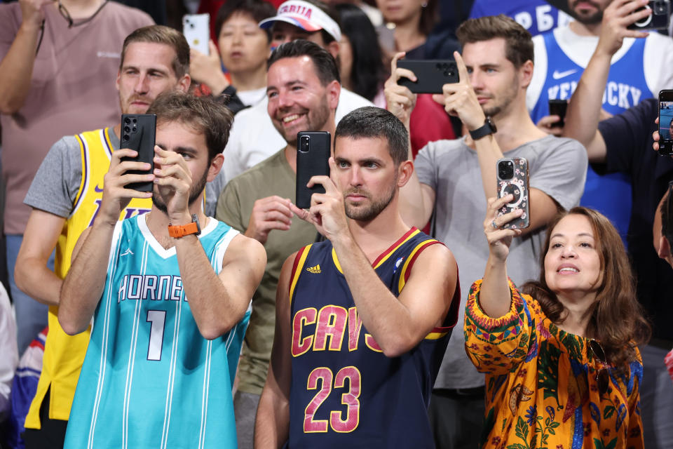 LILLE, FRANCE - JULY 28: Fans take photos during the first half of the men's group stage - Group C game between Serbia and the United States on the second day of the Paris 2024 Olympic Games at Stade Pierre Mauroy on July 28, 2024 in Lille, France.  (Photo by Gregory Shamus/Getty Images)