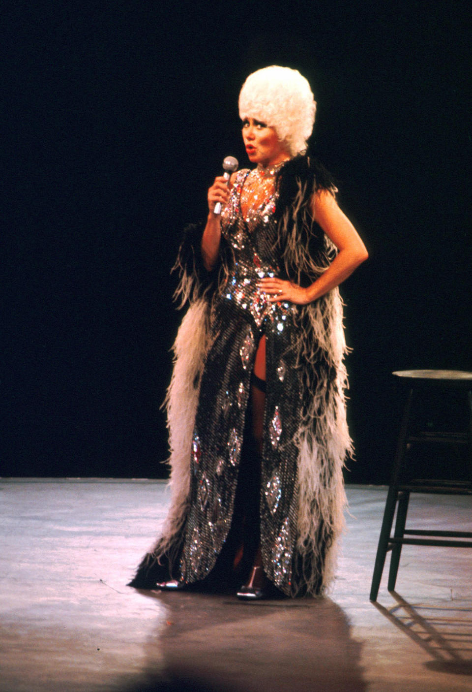 Cher performs onstage.