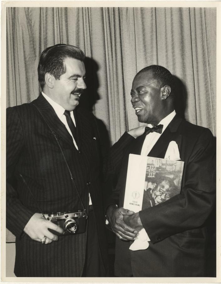 Cotuit photographer Jack Bradley, left, with legendary jazz trumpeter Louis Armstrong. Bradley's photos are the centerpiece of a &quot;Classic Jazz Visions&quot; show Friday at the Cotuit Center for the Arts.