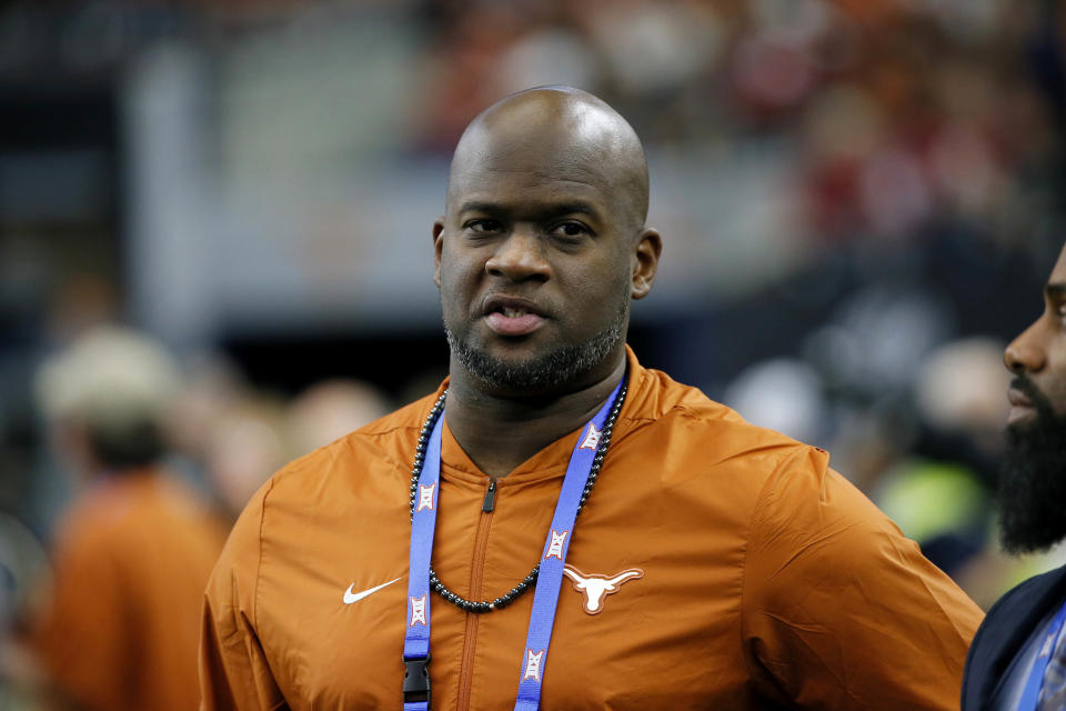 Former Texas Longhorns quarterback Vince Young stands on the sideline during the first half of the NCAA Big 12 Conference football championship against the Oklahoma Sooners, Saturday, Dec. 1, 2018, in Arlington, Texas. Oklahoma defeated Texas 39-27. (AP Photo/Roger Steinman)