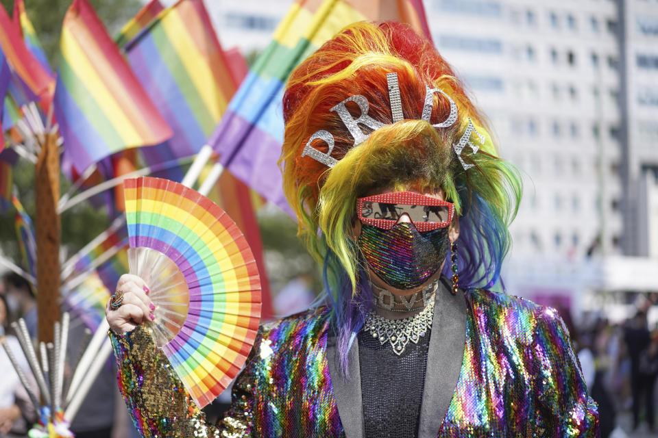 Jerome Champagne takes part in the Christopher Street Day (CSD) parade, in Berlin, Saturday, July 24, 2021. The official motto of the CSD is "Save our Community - save our Pride". (J'rg Carstensen/dpa via AP)